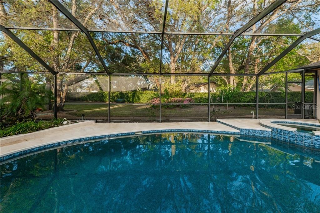 Look at this oasis with heated pool and spa!
