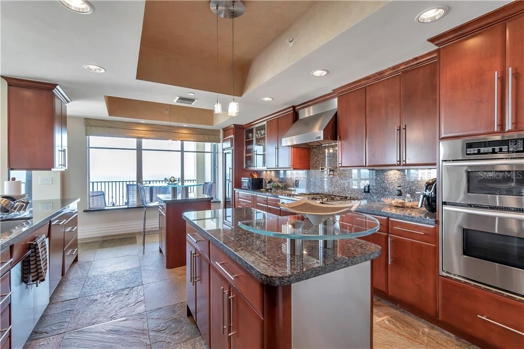 Side view of this amazing kitchen, rounded doors, UPGRADES all around ...
