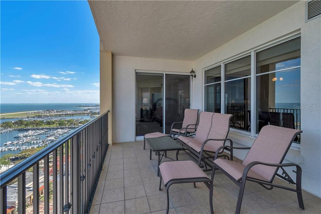 S views of the Tampa Bay, the airport and sliding door to the master bedroom, windows to the kitchen!
