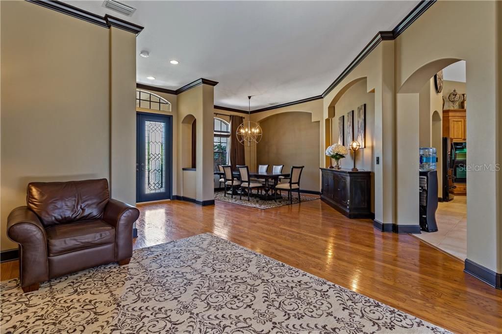 Spacious Area Entry area showcasing a formal Living and Dining room