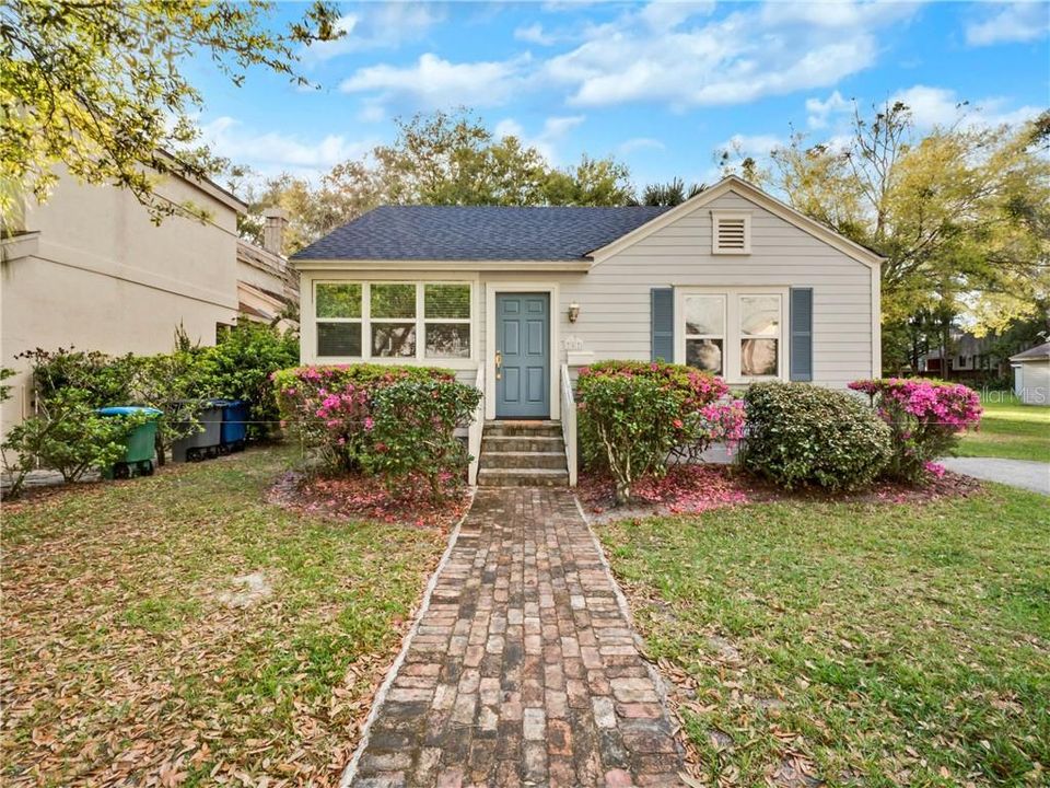Lovely Winter Park Bungalow on Brick Tree Lined Street.