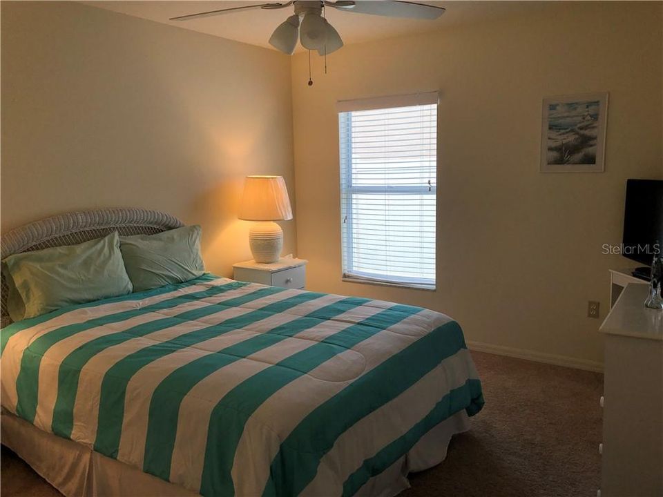 Second bedroom with ceiling fan