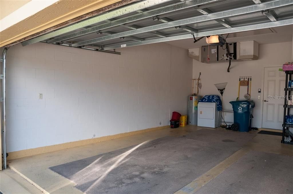 The attached two-car garage has direct access to the kitchen.
