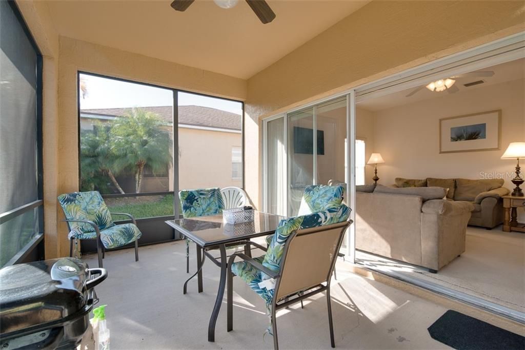 The covered and screened lanai is a great place to enjoy the famous Florida weather.