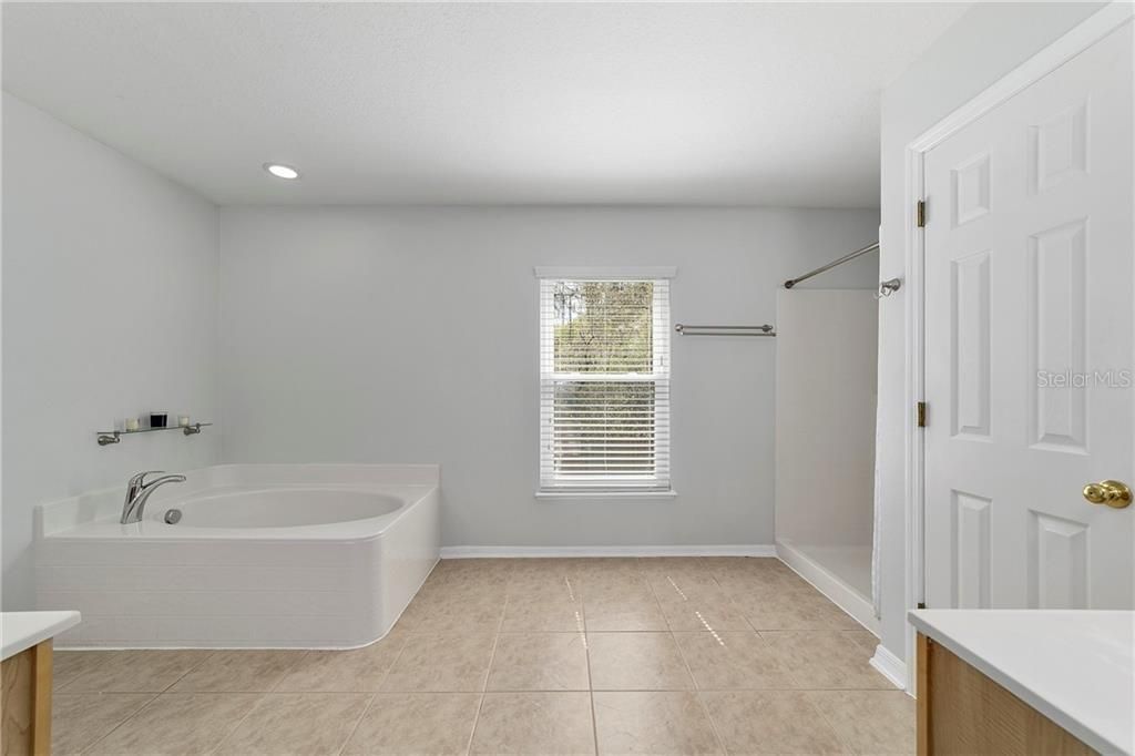 Owner's Bath includes double  vanities, soaking tub and separate shower