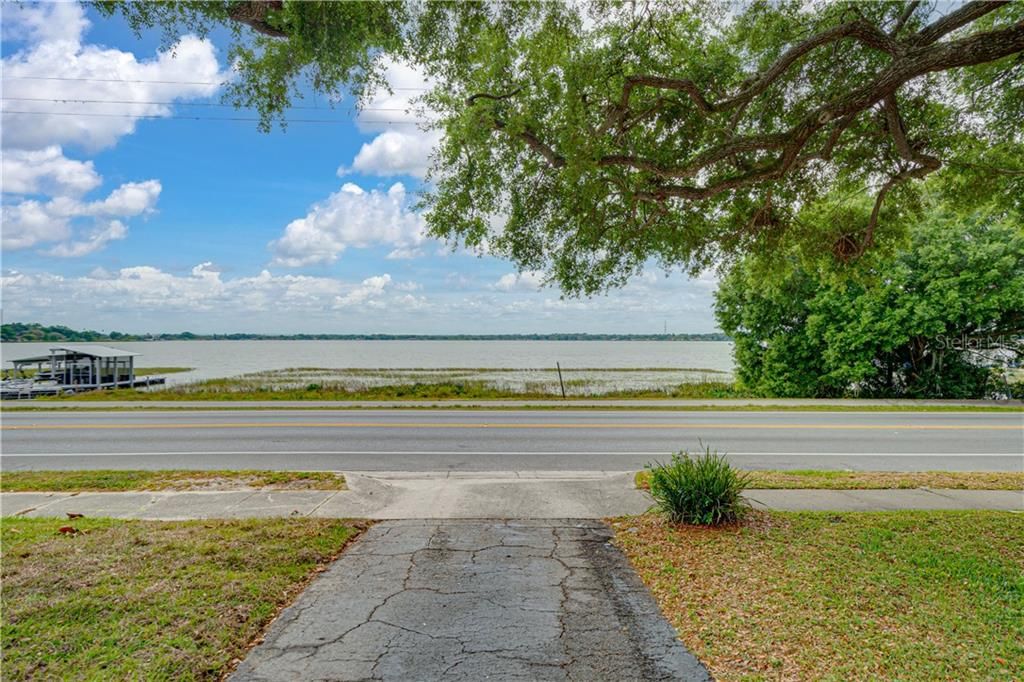 VIEW FROM THE STRAIGHT DRIVEWAY LOOKING ACROSS AT THE LAKEFRONT PROPERTY INCLUDED AND LAKE HOWARD