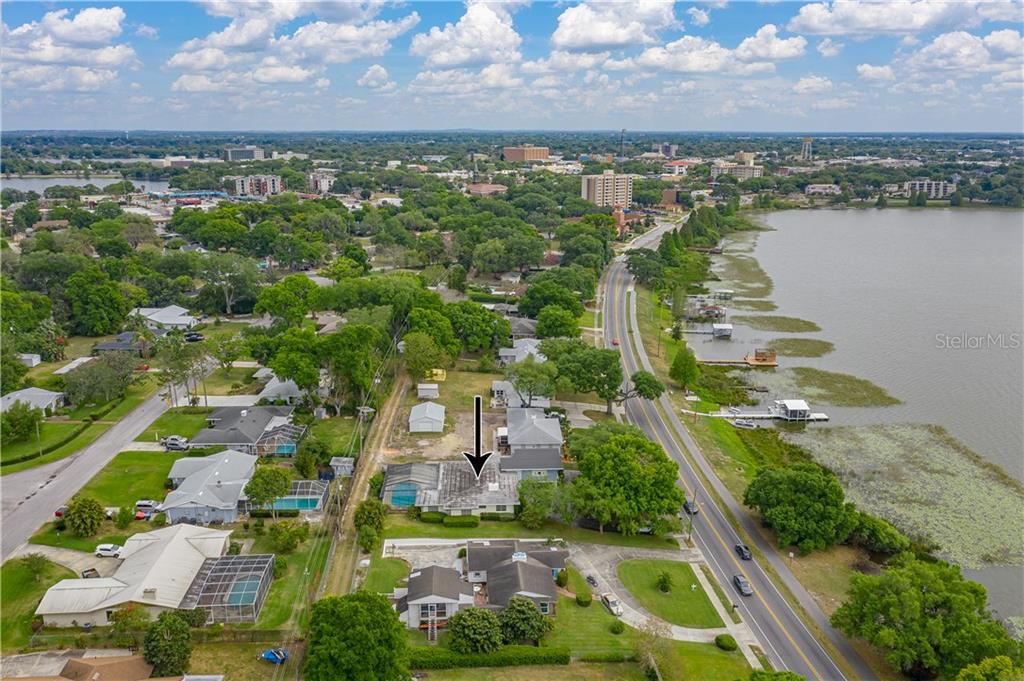 AERIAL VIEW OF HOUSE WITH VIEW TOWARDS DOWNTOWN WINTER HAVEN