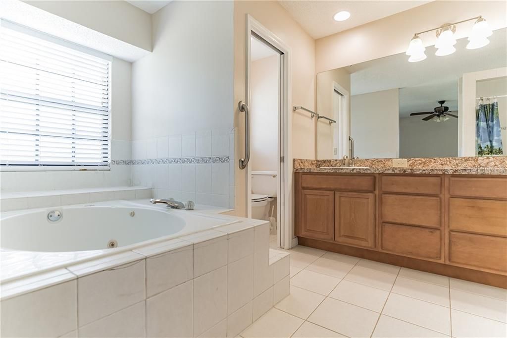 The master bath features upgraded tall dual vanity.