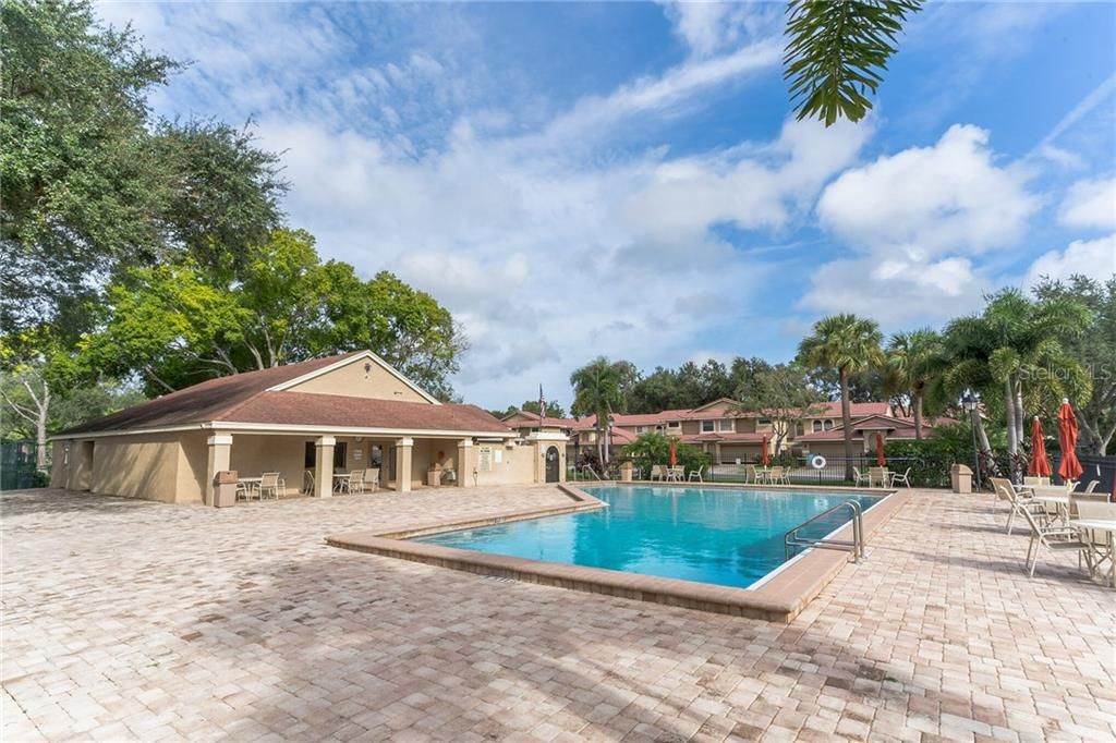 Heated community pool and shaded cabana.