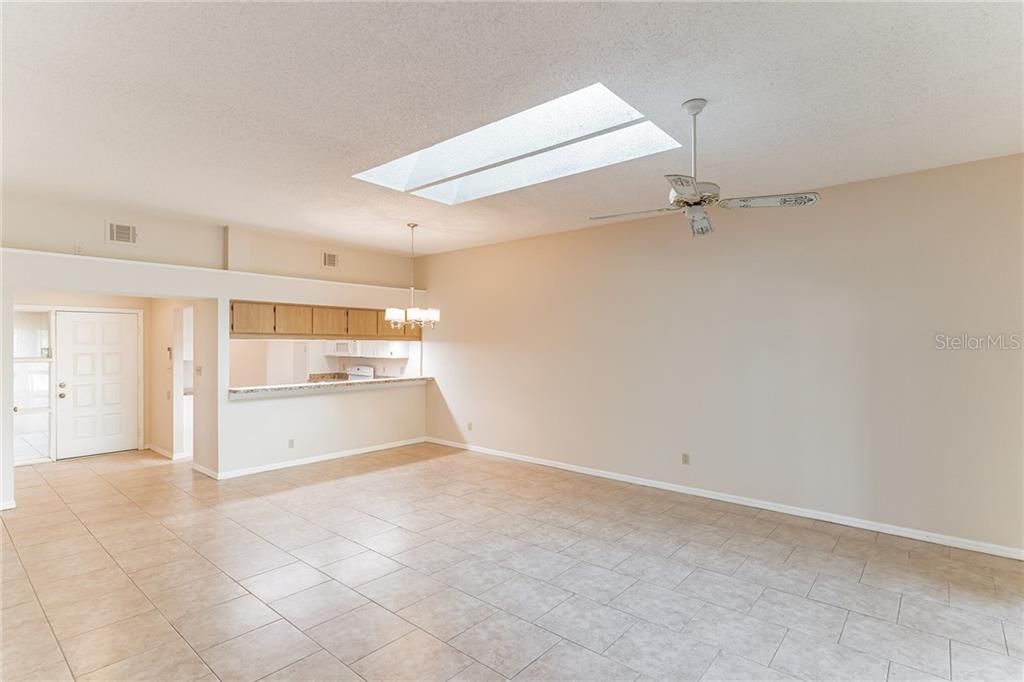 Spacious open floor plan featuring plant shelves to display your favorite sculptures and artifacts.