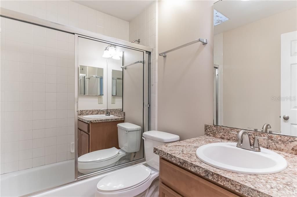 The 2nd bath features a bath tub and shower.