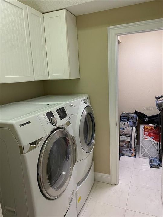 Indoor Laundry room and large storage closet.