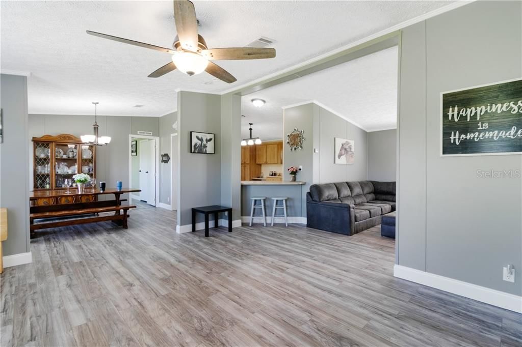 Beautiful new floors, updated interior with large baseboards and crown molding