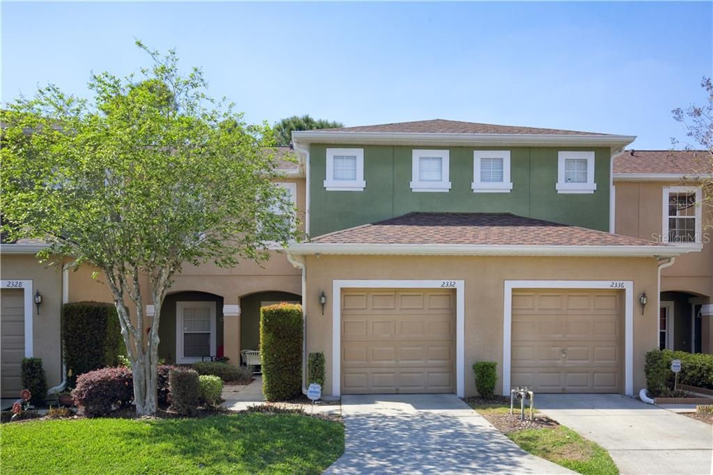 Front view of 2332 Bexley Place - 2 bedrooms and 2 1/2 bathrooms with a 1 car garage.