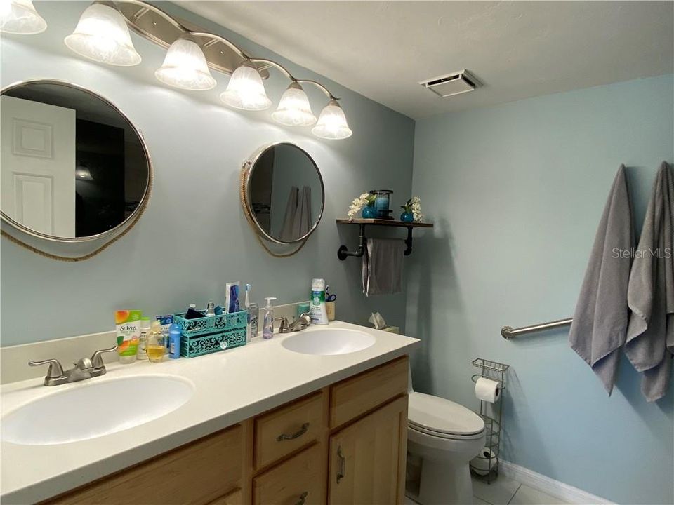 Updated master bath with dual sinks.