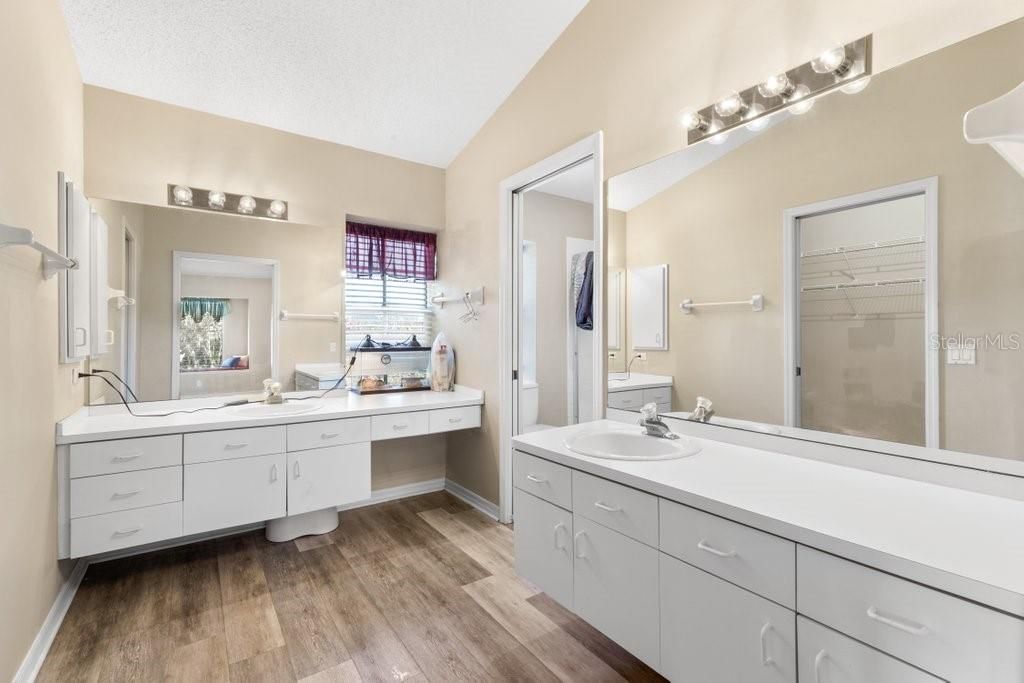 Master bathroom with double sinks, separate toilet shower area and large walk in closet!!!!!!