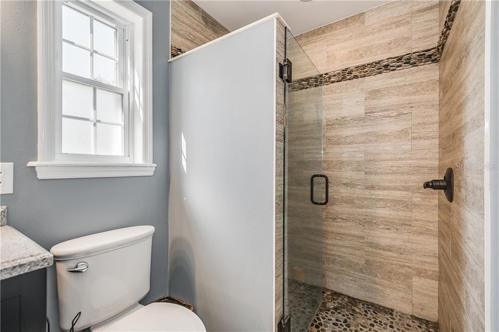 Completely remodeled Master Bathroom. Double pane windows. Walk in shower. House Completely Replumbed (2016). Tankless Water Heater.