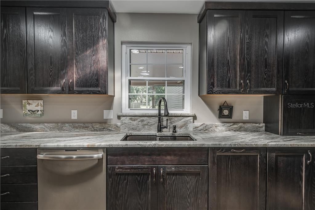 Completely Remodeled Kitchen. New KraftMaid Cabinetry - Solid Wood Kitchen Cabinets, Quartzite Kitchen Countertops, New GE Profile Series Energy Star Appliances. Dishwasher with Top Hidden Controls. Double Pane Windows. House Completely Replumbed (2016). Tankless Water Heater.