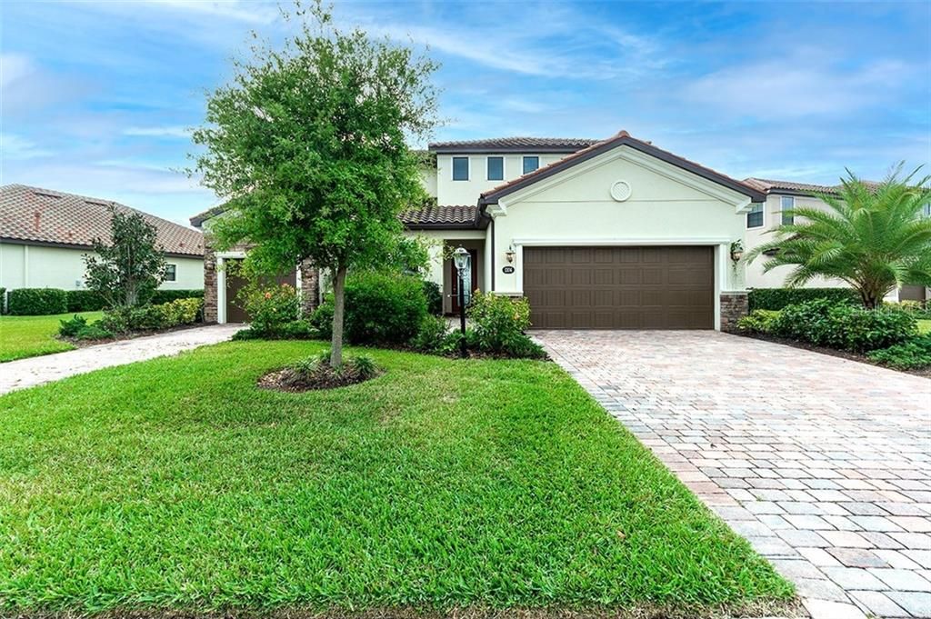 Beautiful "Next-Generation" Home Showcasing Separate In-Law Suite Quarters on Left