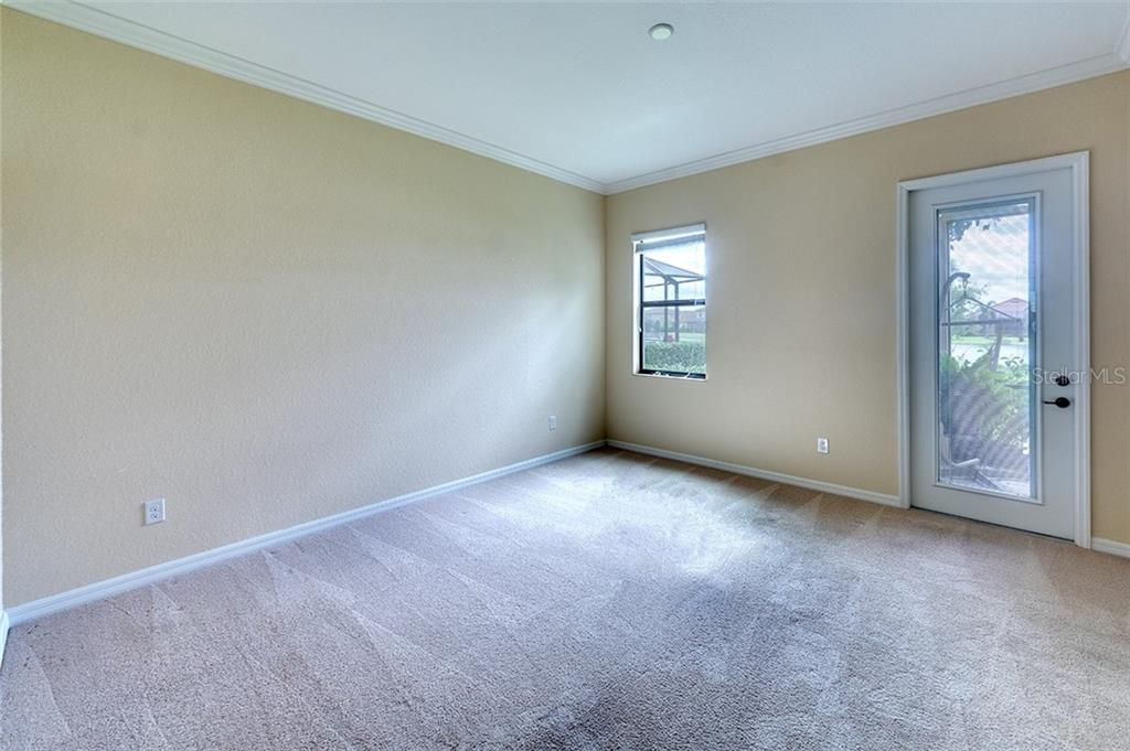 Impressive In-Law Suite Living Area Featuring Door to Lanai