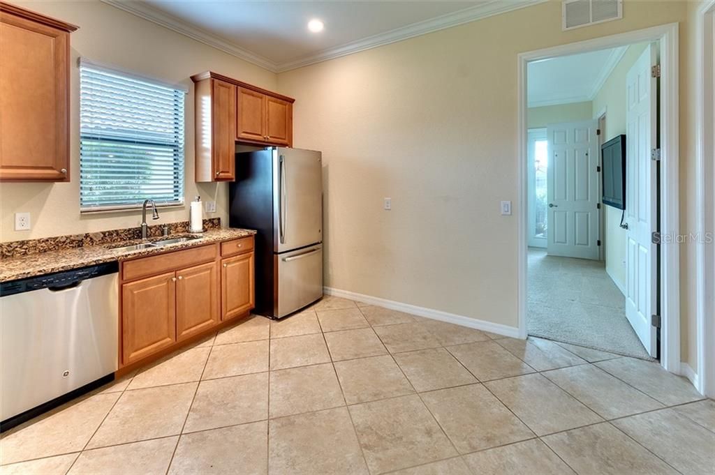 In-Law Suite Kitchen features Stainless Steel Appliances including Microwave, Dishwasher, and Fridge.