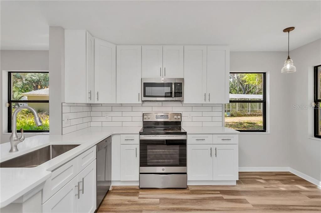 TILE BACKSPLASH AND NEW LIGHTING