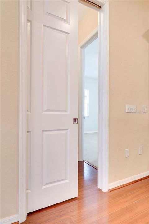 Pocket door that separates 2nd bedroom and 2nd bathroom from the rest of the house offering privacy.