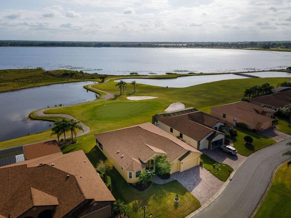 Yellow house is subject property. Water views for miles as well as golf course views.