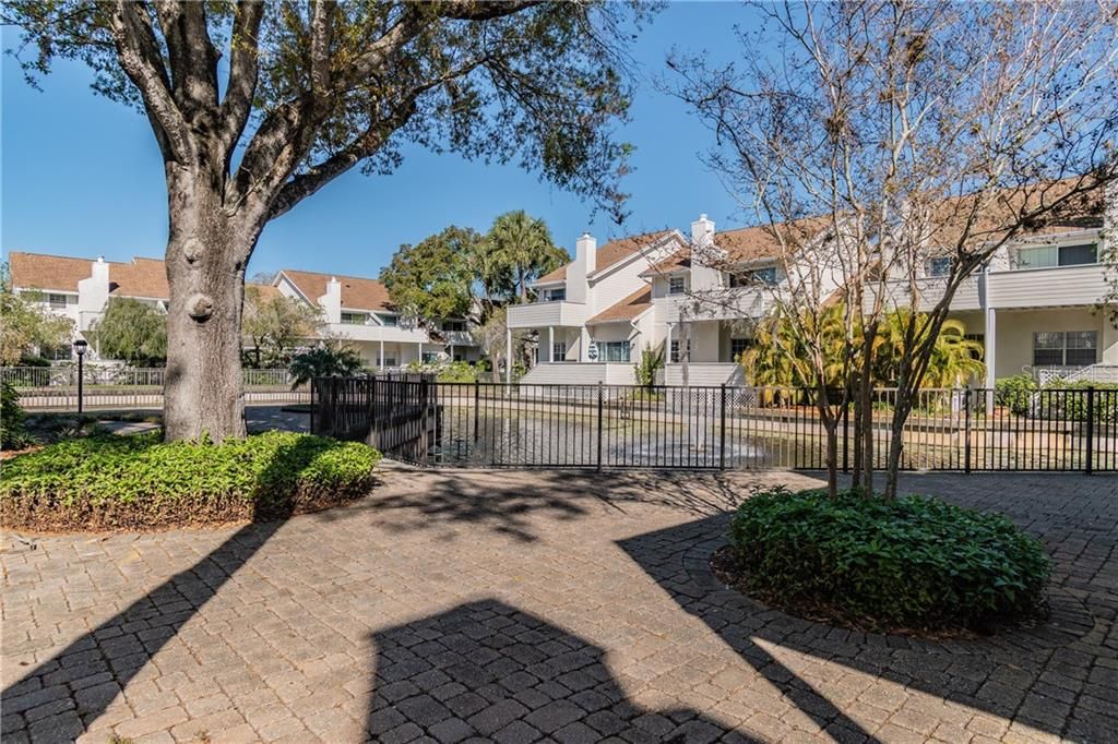 Serene Pond within gated courtyard, accessible to community only
