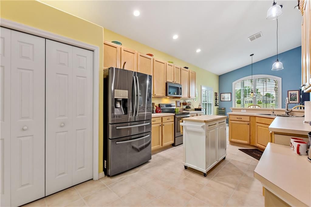 Newer black stainless steel appliances, LED lighting, pull-outs in lower cabinets
