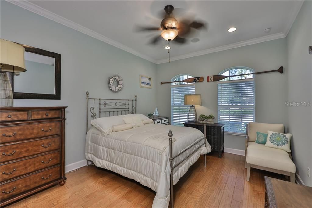 Second bedroom is spacious and also has the matching engineered hardwood flooring.