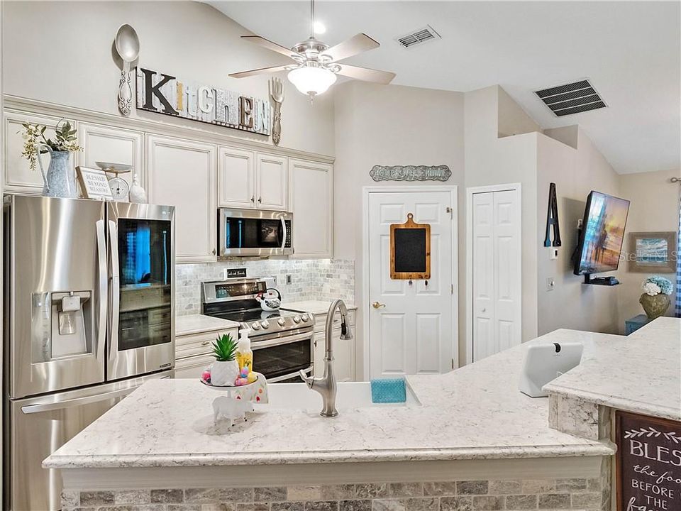 Overview of spacious and chic kitchen