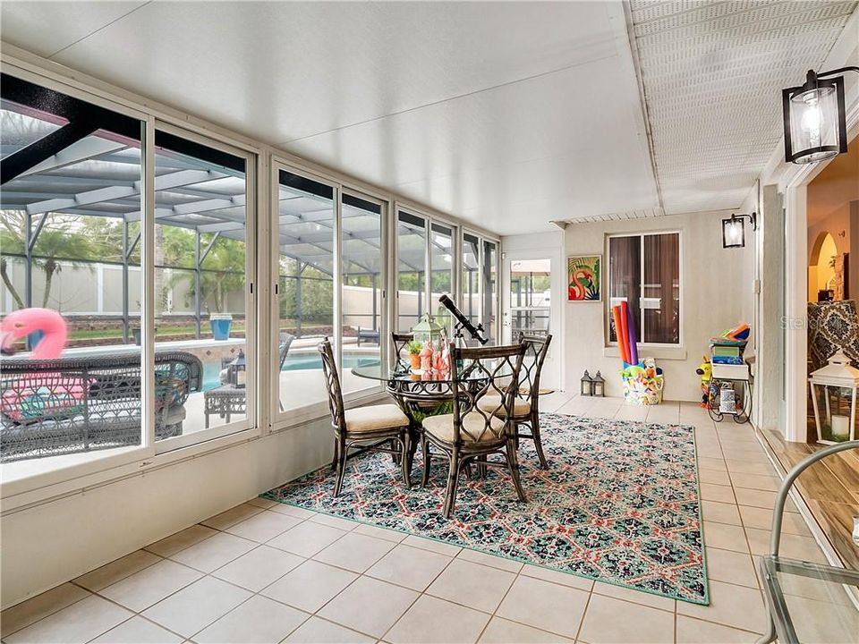 Enclosed porch lined with windows