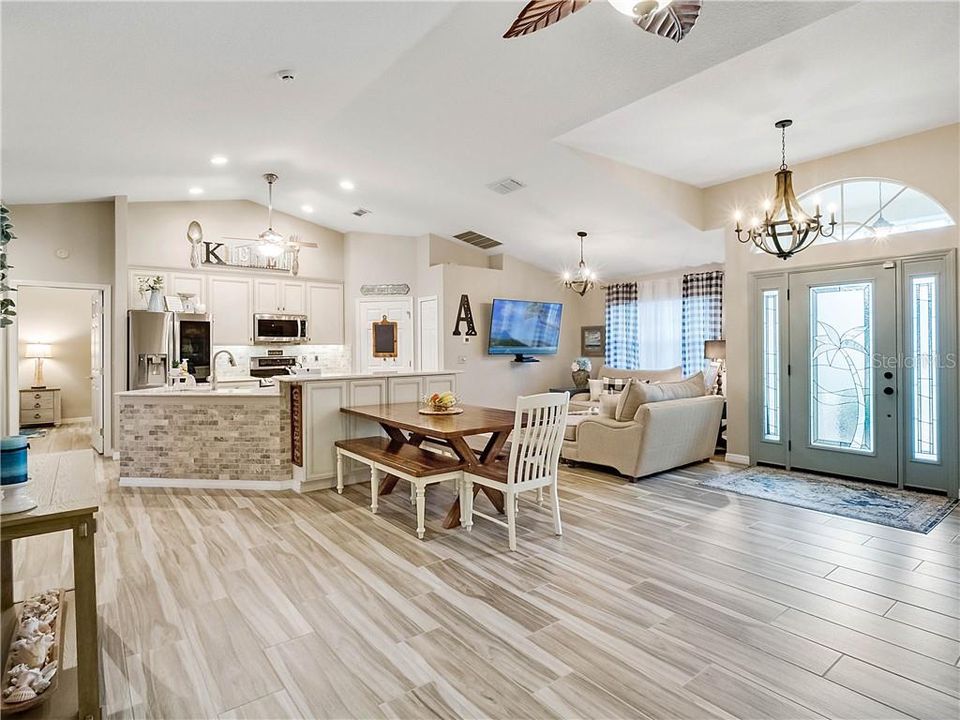 Overview of kitchen with eating and sitting areas