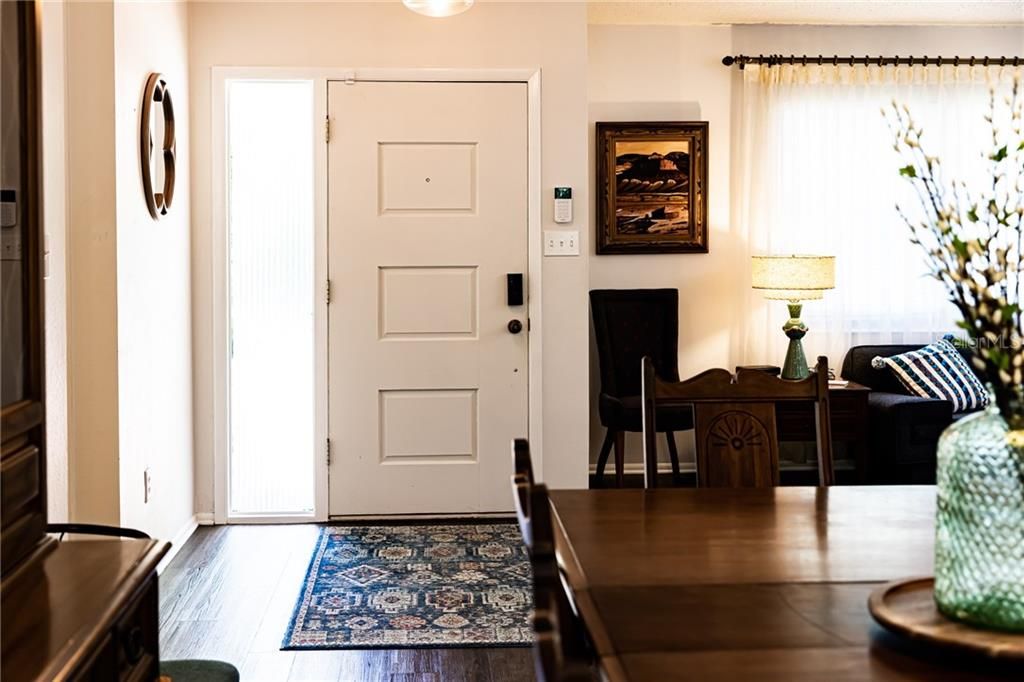 Entry Way to a Lovely Living Room and Dining Room