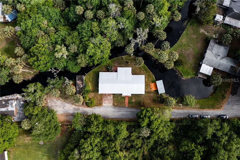 Drone Shot of the Brand New Metal Roof and the Old-Florida Scenery