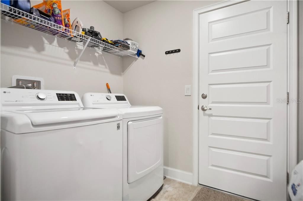 Laundry room just where you would expect it, between the garage and kitchen.