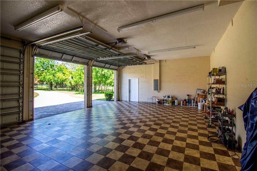 All garage flooring is ceramic tile (both attached and detached garages).