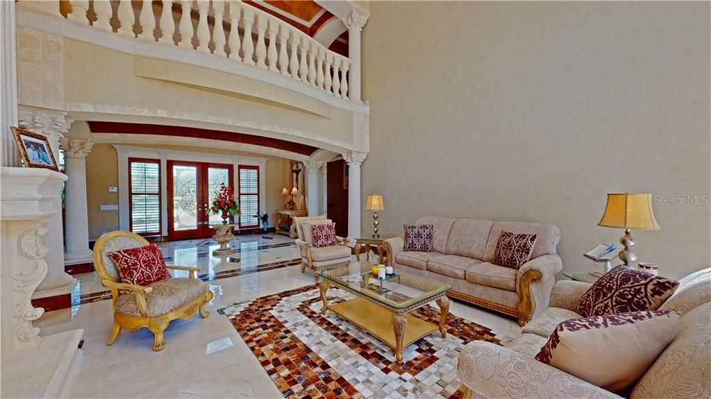 Living room with cathedral ceilings.