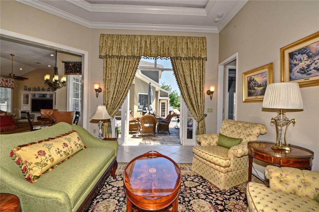 Living Room with French doors to Outdoor Patio & Pool