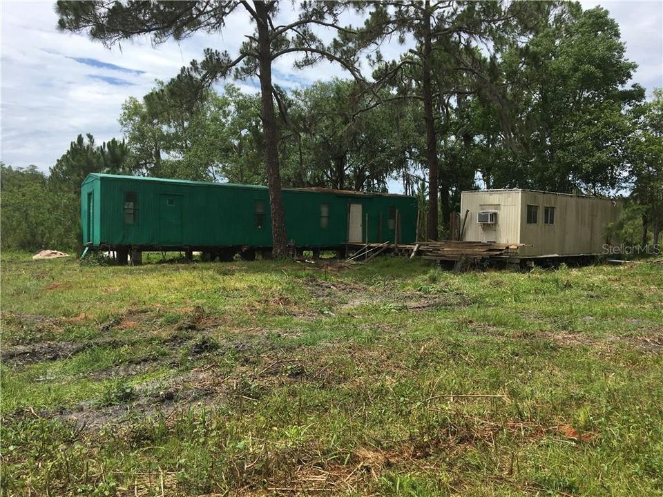 Mobile homes (shell) on property