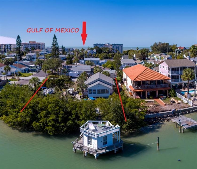 Water Front Lots  12 & 13.   Lot 12  has 2 bedroom 1 bath + Den w/detached 1 car garage.   Lot 13 Vacant lot.  Lot size see survey in the attachments.   Short Walk to the Beach