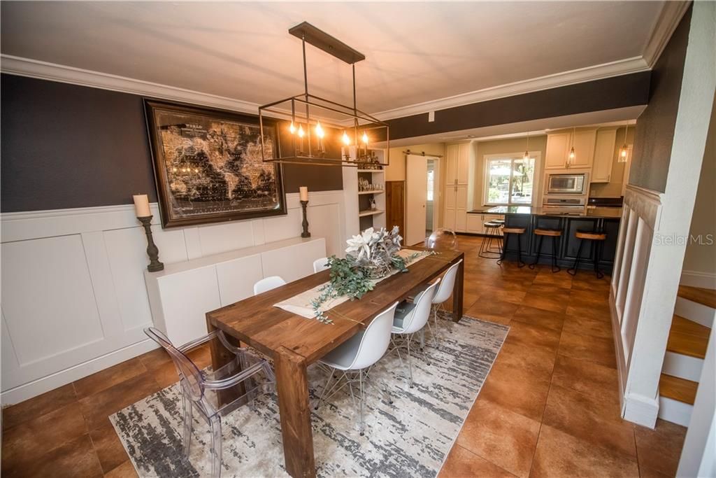 Large formal dining space off kitchen provides the perfect setting for entertaining