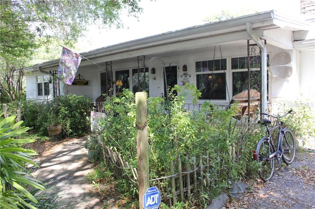 Front entrance into this 2 BR 3 Ba Clearwater home with a quaint front porch!