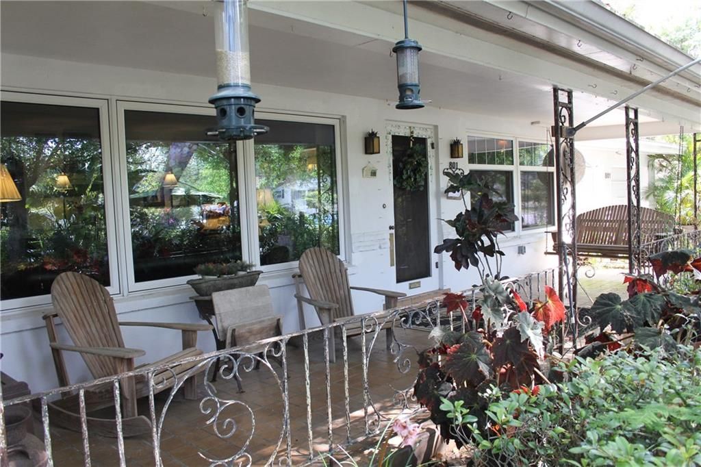 Nice sized front porch with a swing