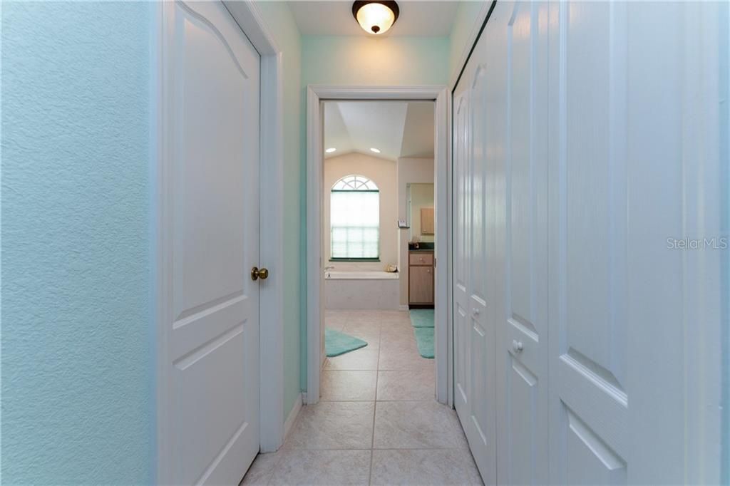 The adjacent Master bath offers two closets, a Jacuzzi tub, a separate shower, and dual sinks.
