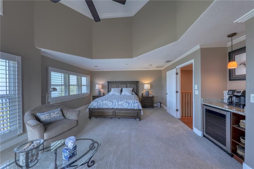 Built in Refrigerator in your Master Bedroom.  Grab coffee or wine to  enjoy the sights and sounds out your private master bedroom patio. Beautiful sunsets, of course, but the sky is beautiful  in the morning as the sun comes up from the East too!