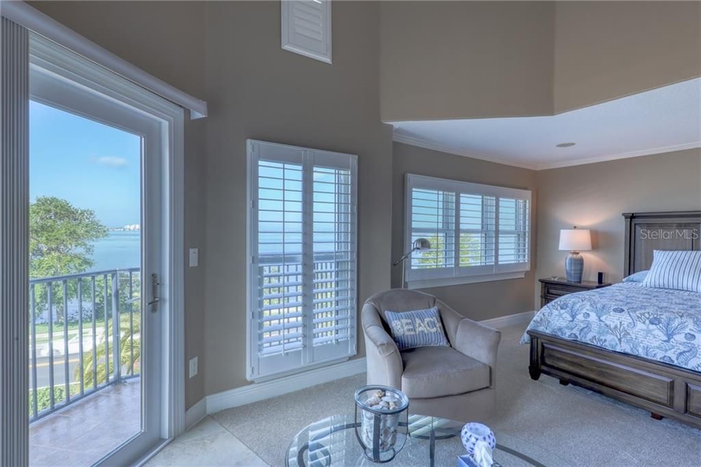Large Windows and Patio Door make this a light filled  master with great views from throughout the entire room!