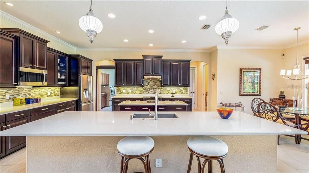 This breakfast bar/island is perfect for a quick bite, or to sit and do homework while meal prep is going on. Imagine friends and family gathered around as THANKSGIVING meal is prepared!