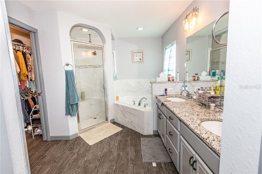 double sink vanity, and garden tub to relax in.. plus shower !